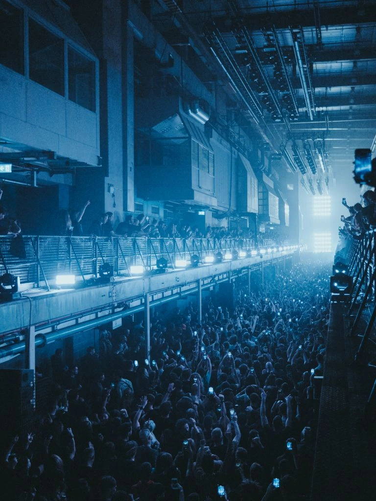 Crowd-control barriers deployed in queue lines at a large outdoor event